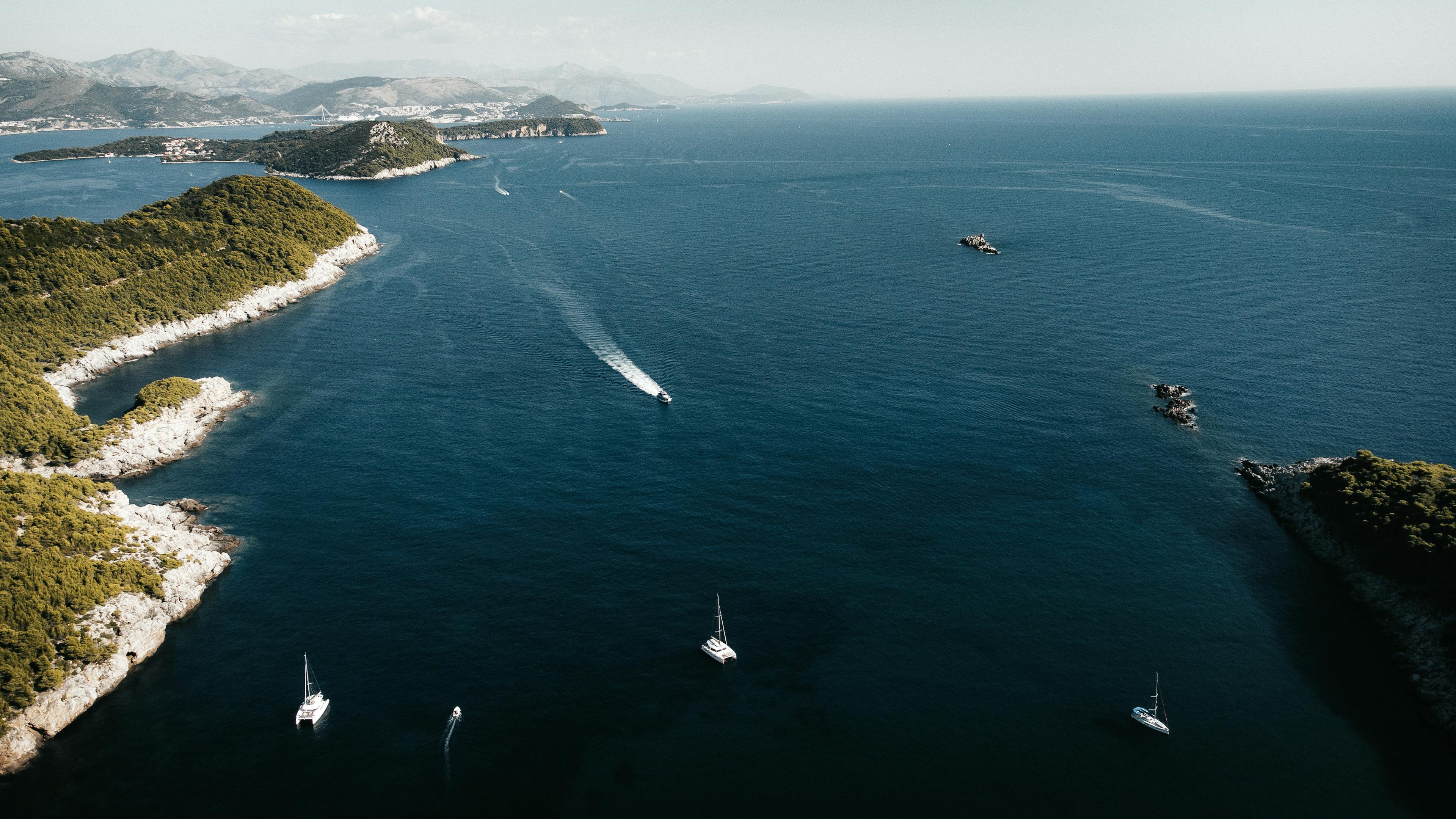 Aerial view of sailboats and lush islands near Lopud, Dubrovnik in the Adriatic Sea