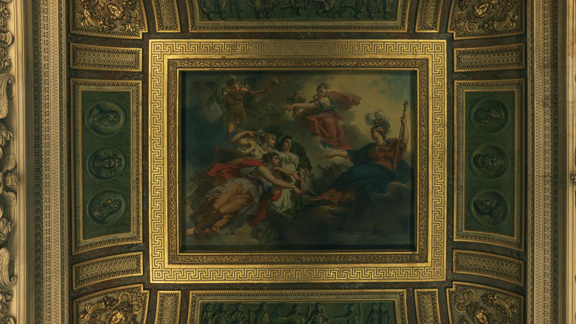 A close-up of an ornate ceiling painting in the Louvre