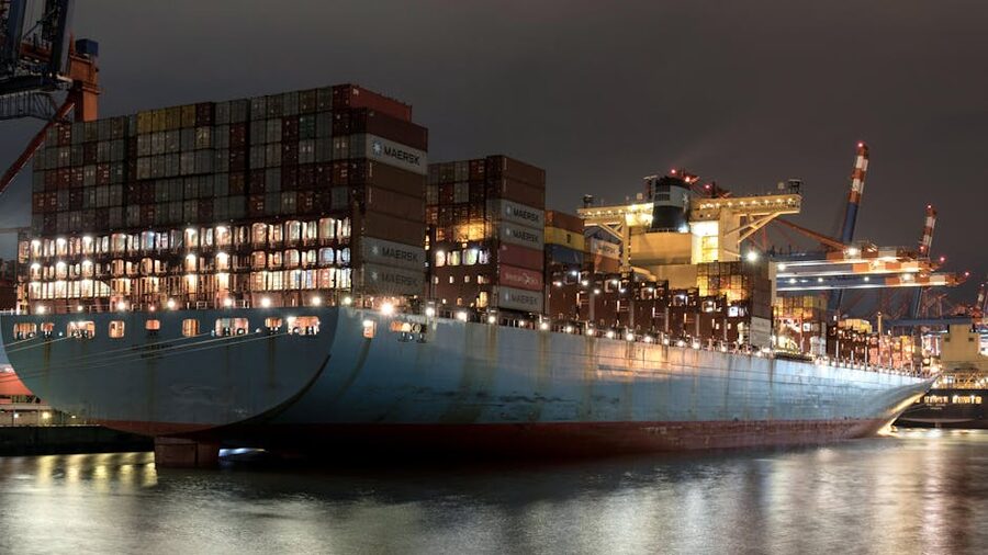 Cargo ship loaded with containers night