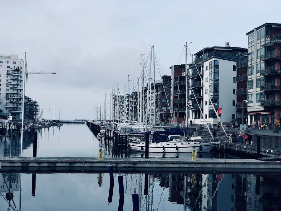 Contemporary marina with sailboats docked in Malmö harbour Sweden