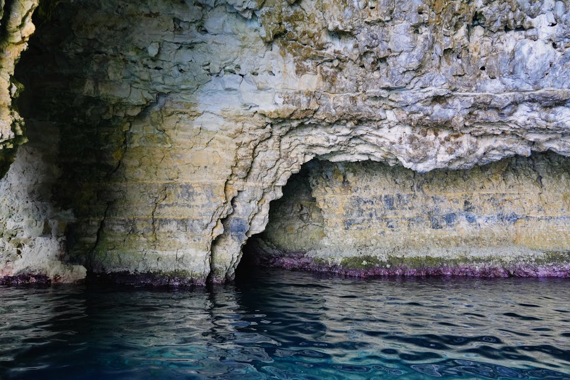 Natural cave formations along Malta coastline