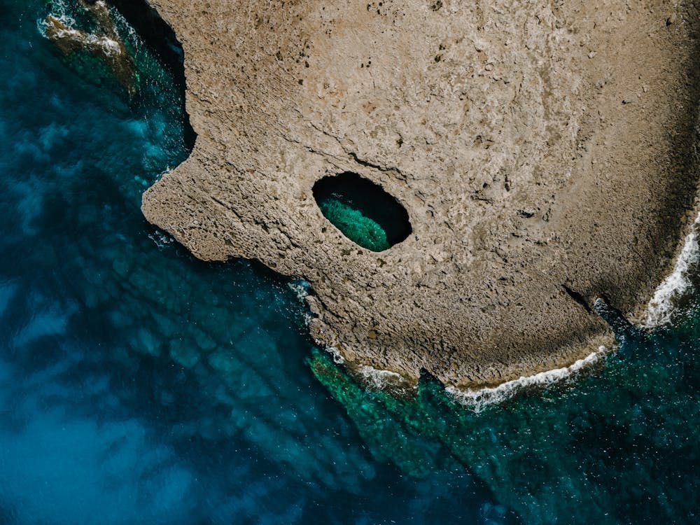 Aerial view of Malta Mellieha rock pool and coastline