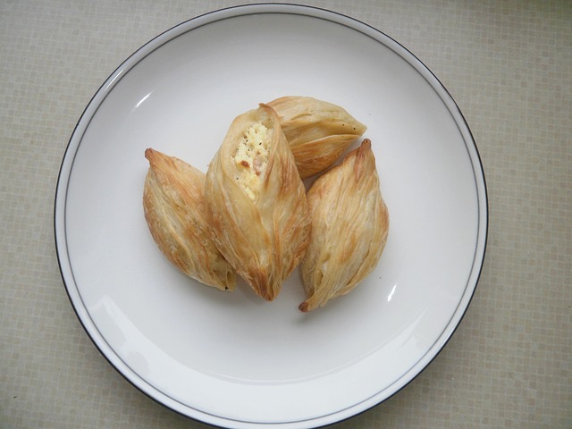 Traditional Maltese pastizzi served on a white plate