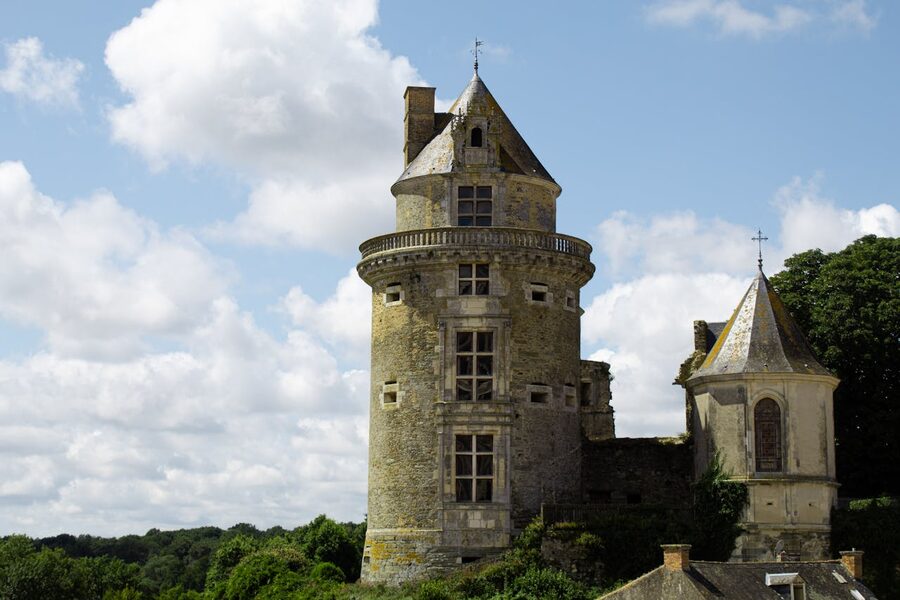 Medieval castle tower against blue sky
