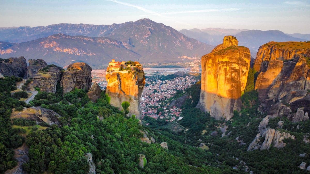 Aerial view of Meteora monasteries perched on towering rock formations