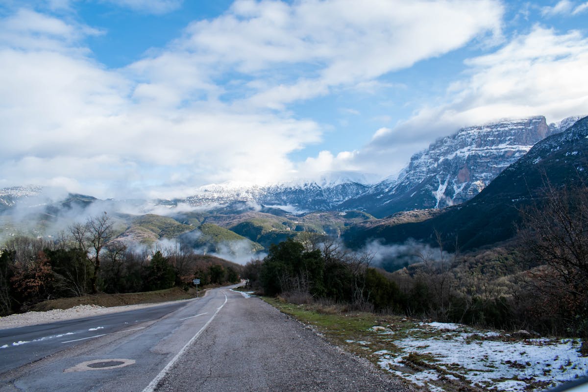 Winter mountain landscape near Greece with a winding road
