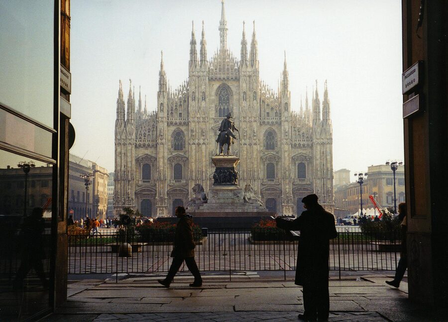 Milan Cathedral with silhouettes of people