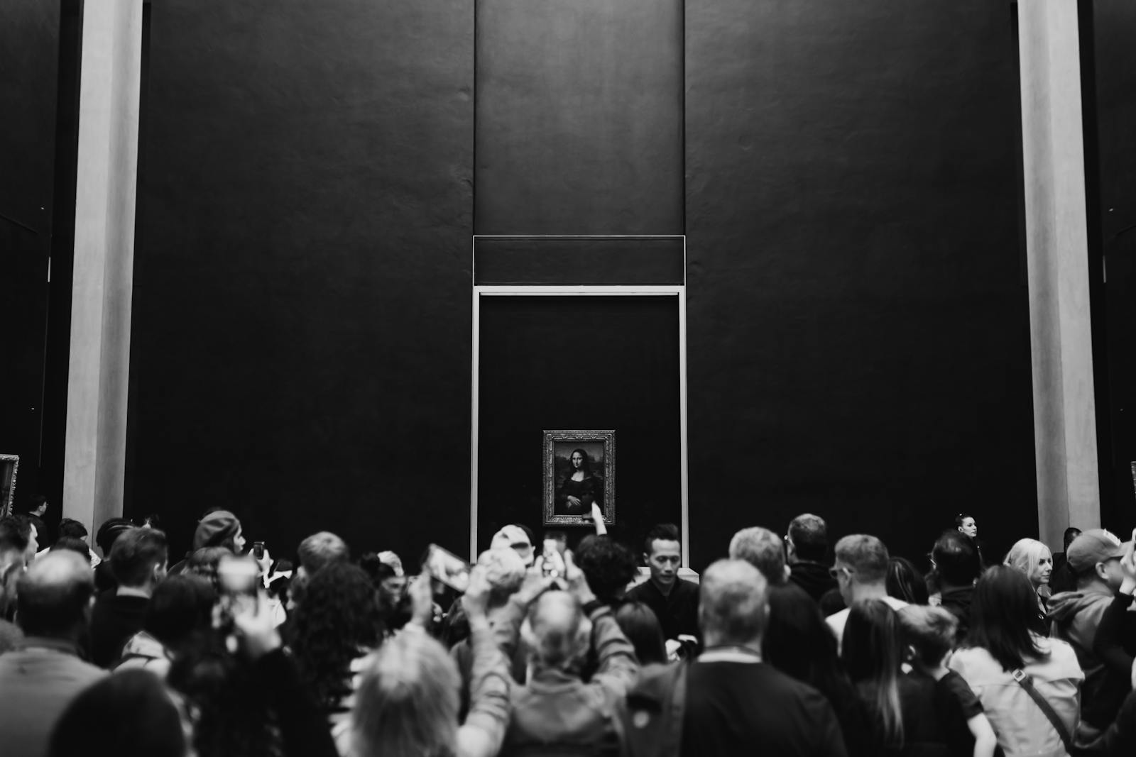 A large crowd gathered to view the Mona Lisa at the Louvre Museum in Paris