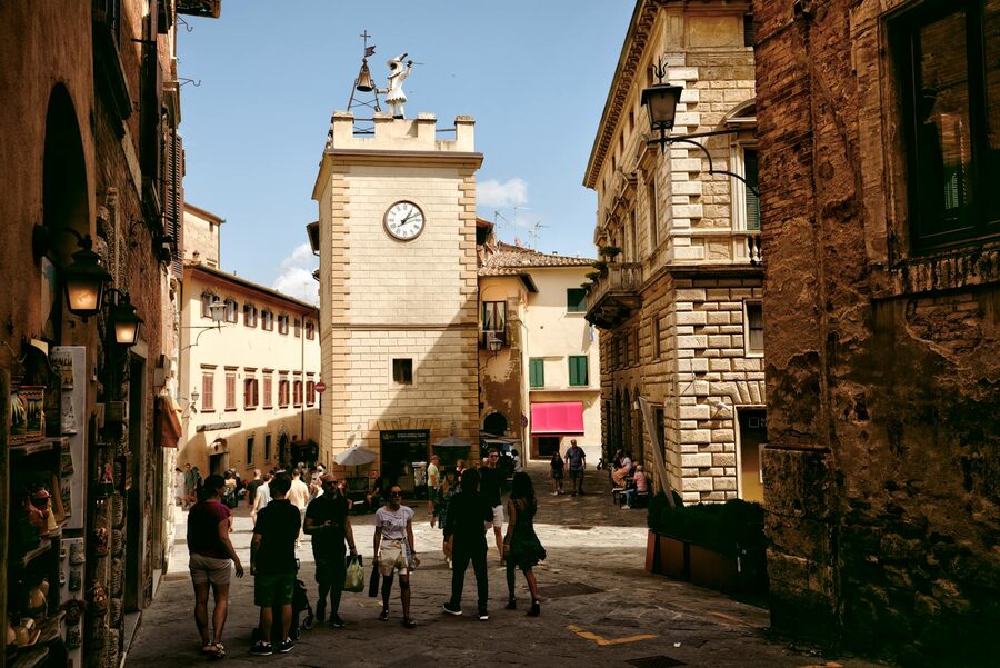 Montepulciano cobblestone streets and clock tower
