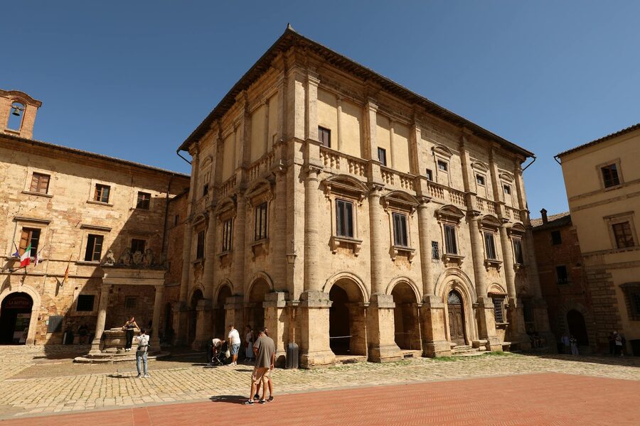 Sunlit Renaissance building in Montepulciano town square