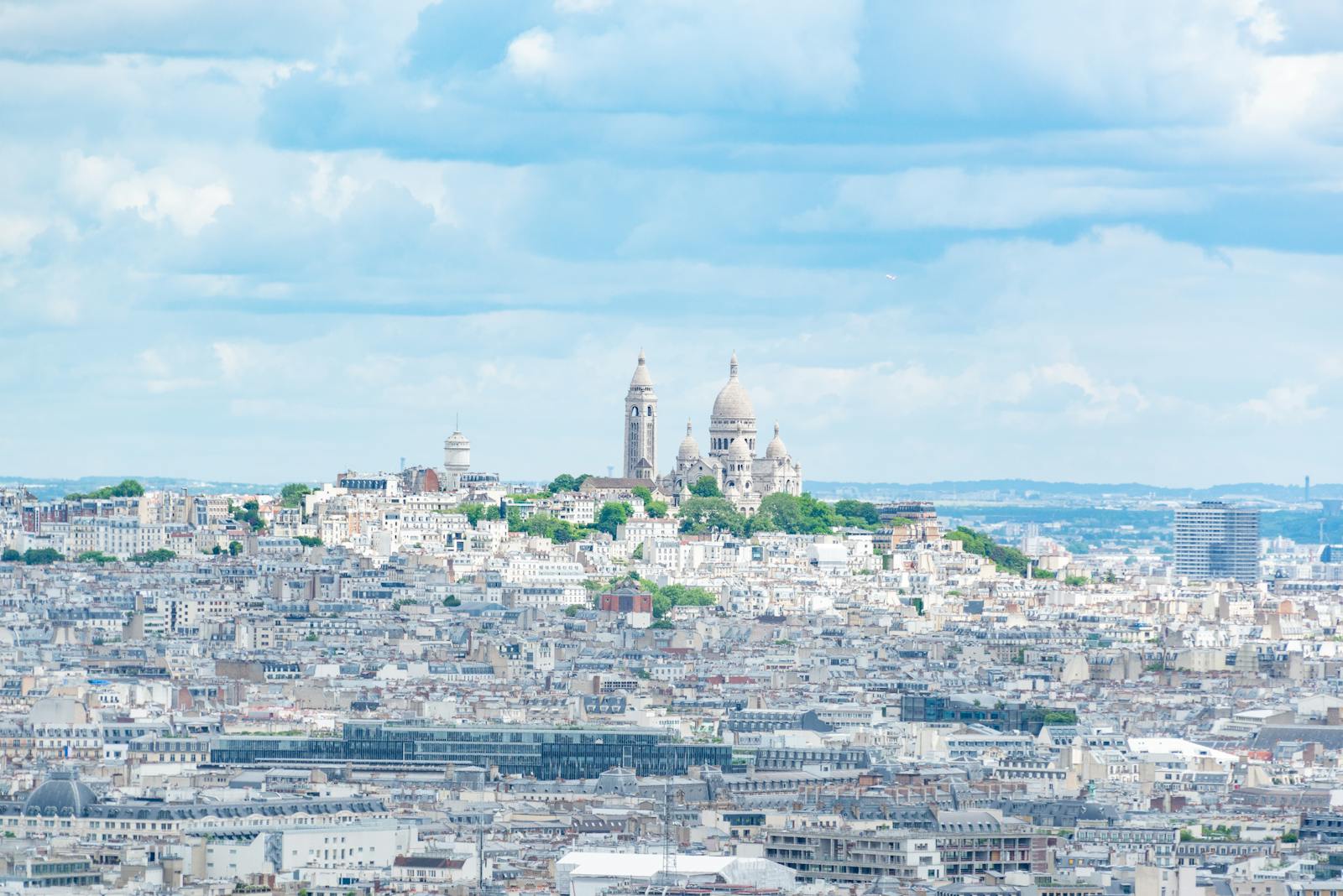 Aerial view of Montmartre and Sacre-Coeur showcasing Paris architectural beauty
