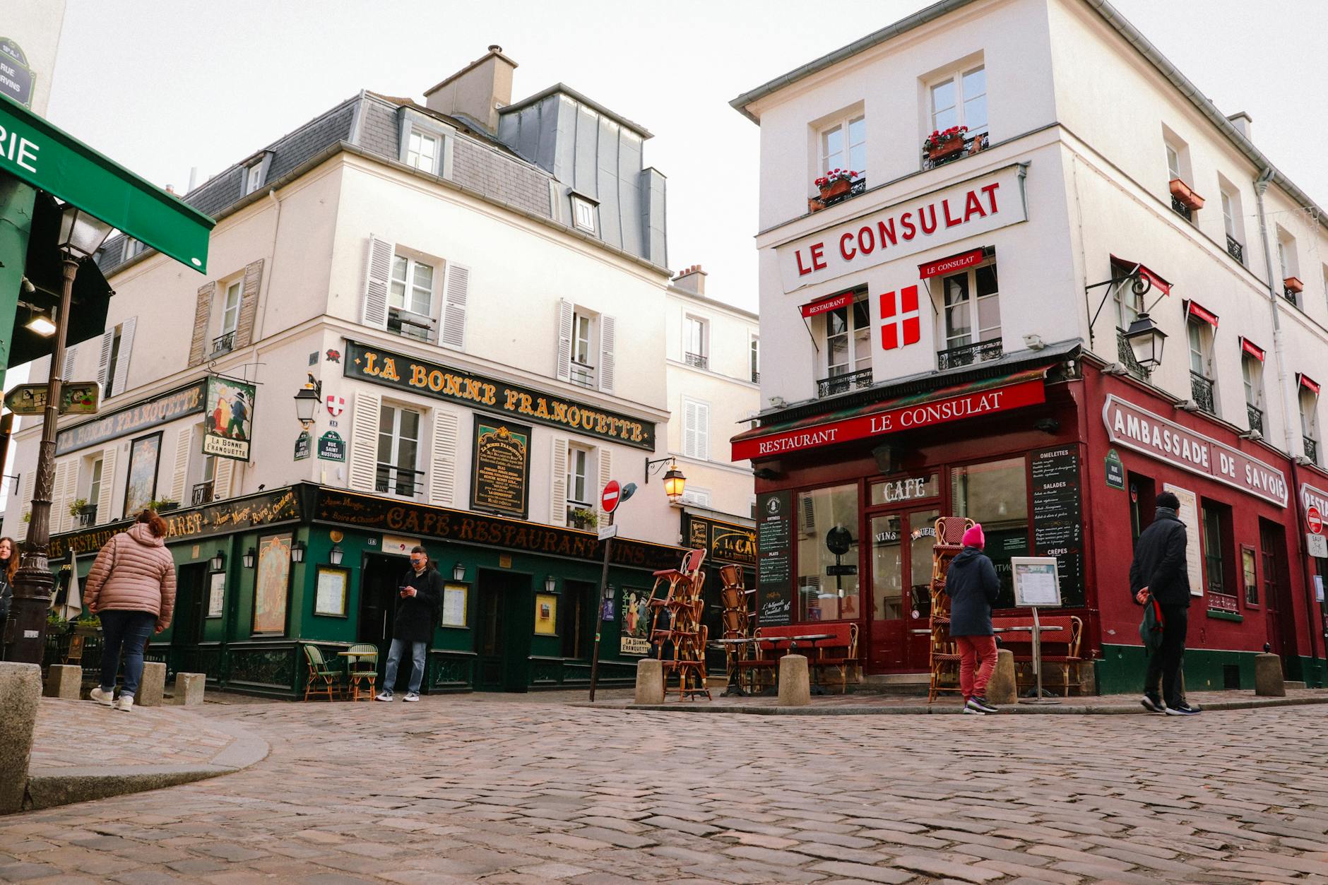 Charming Montmartre cafés on a Paris street