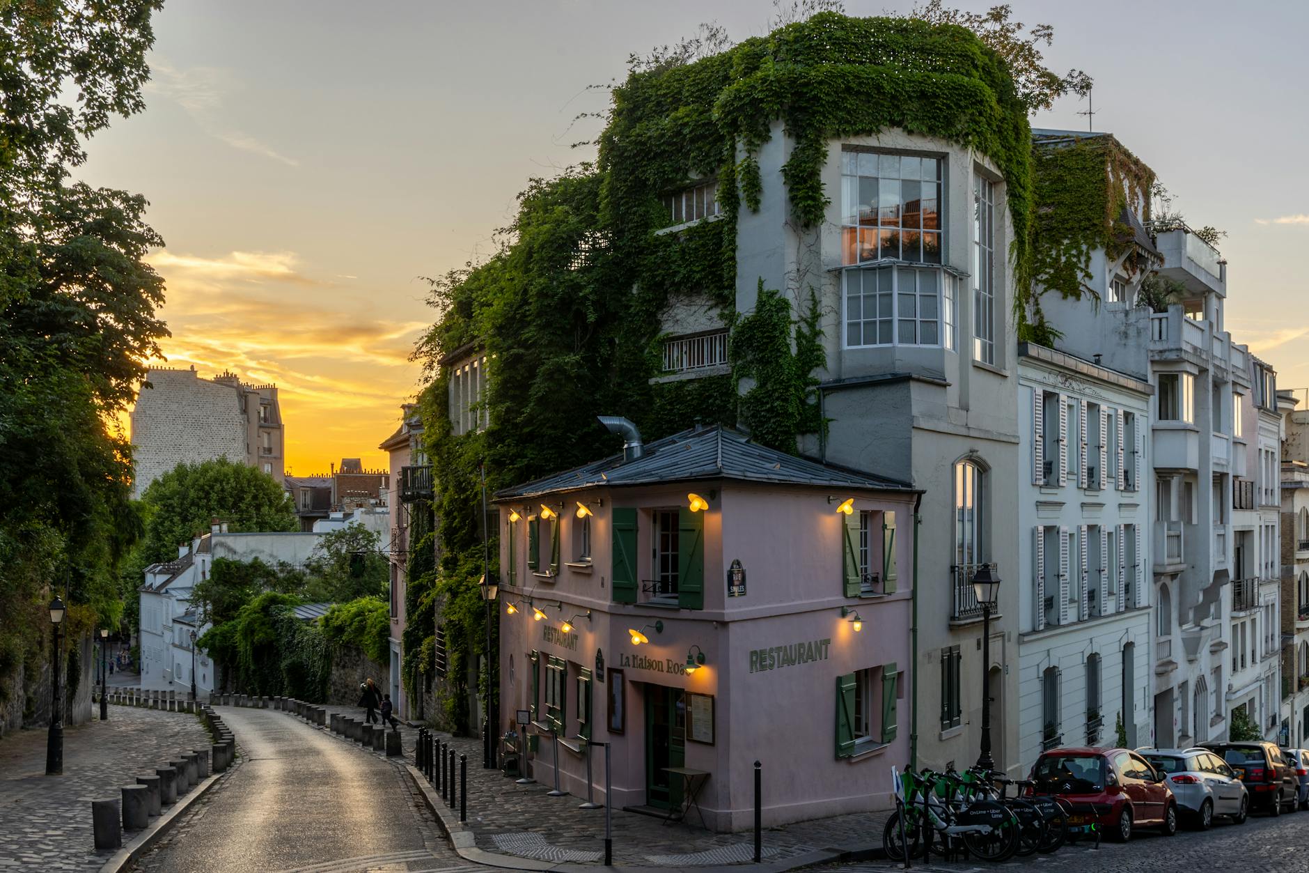 Serene Montmartre Paris street with restaurant seating