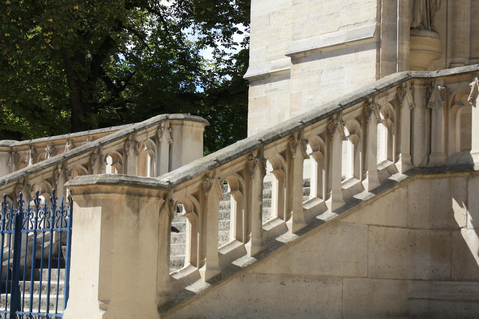 Stone staircase in Montmartre Paris under bright sunlight