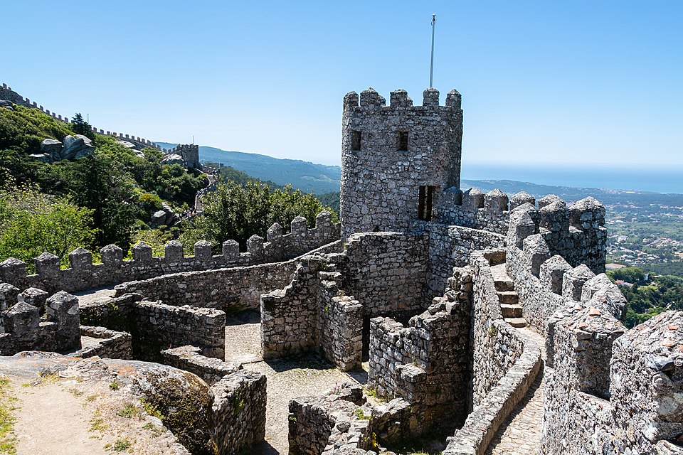 Ancient stone walls of the Castle of the Moors winding across Sintra hilltop