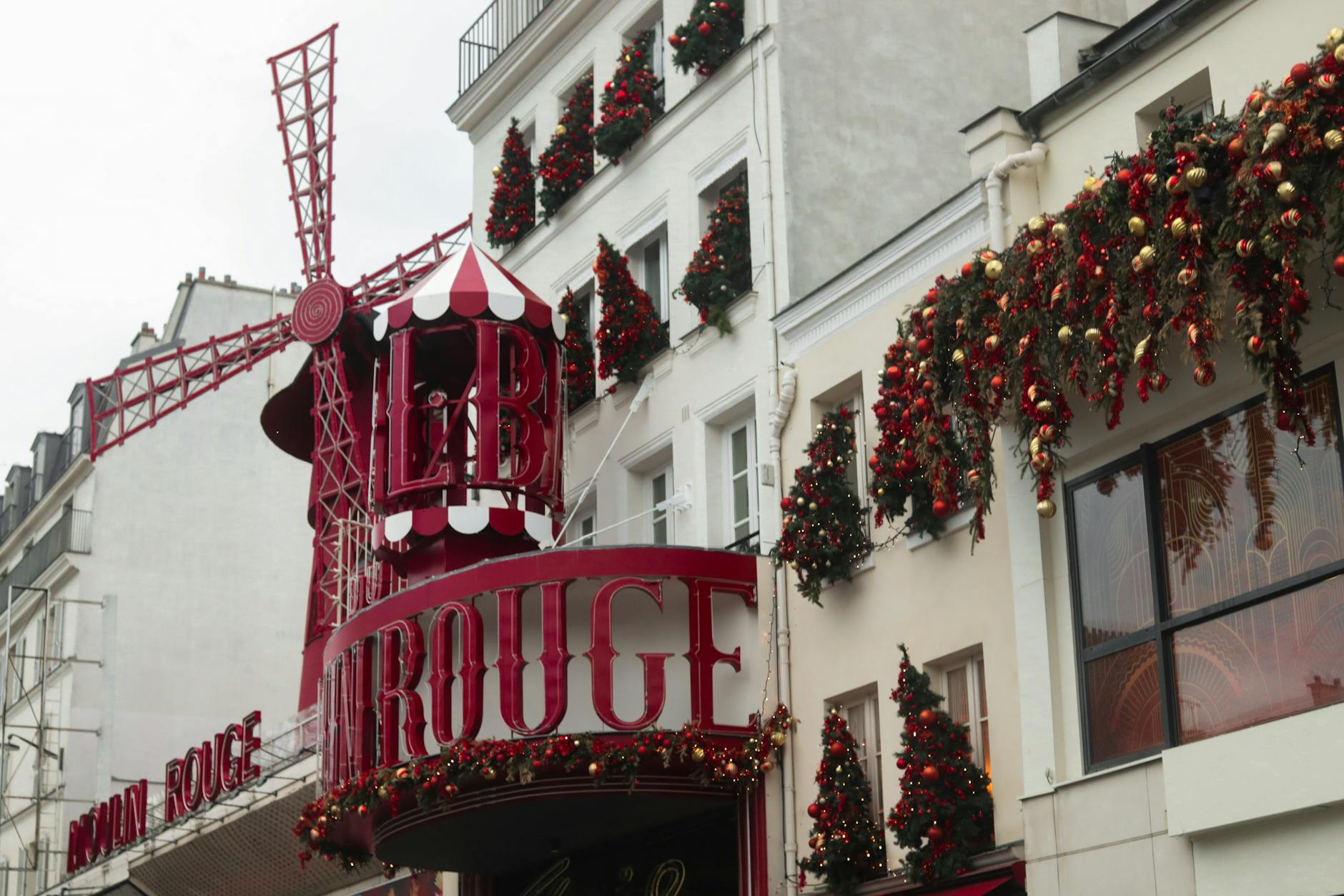 Moulin Rouge in Paris festively decorated with Christmas ornaments
