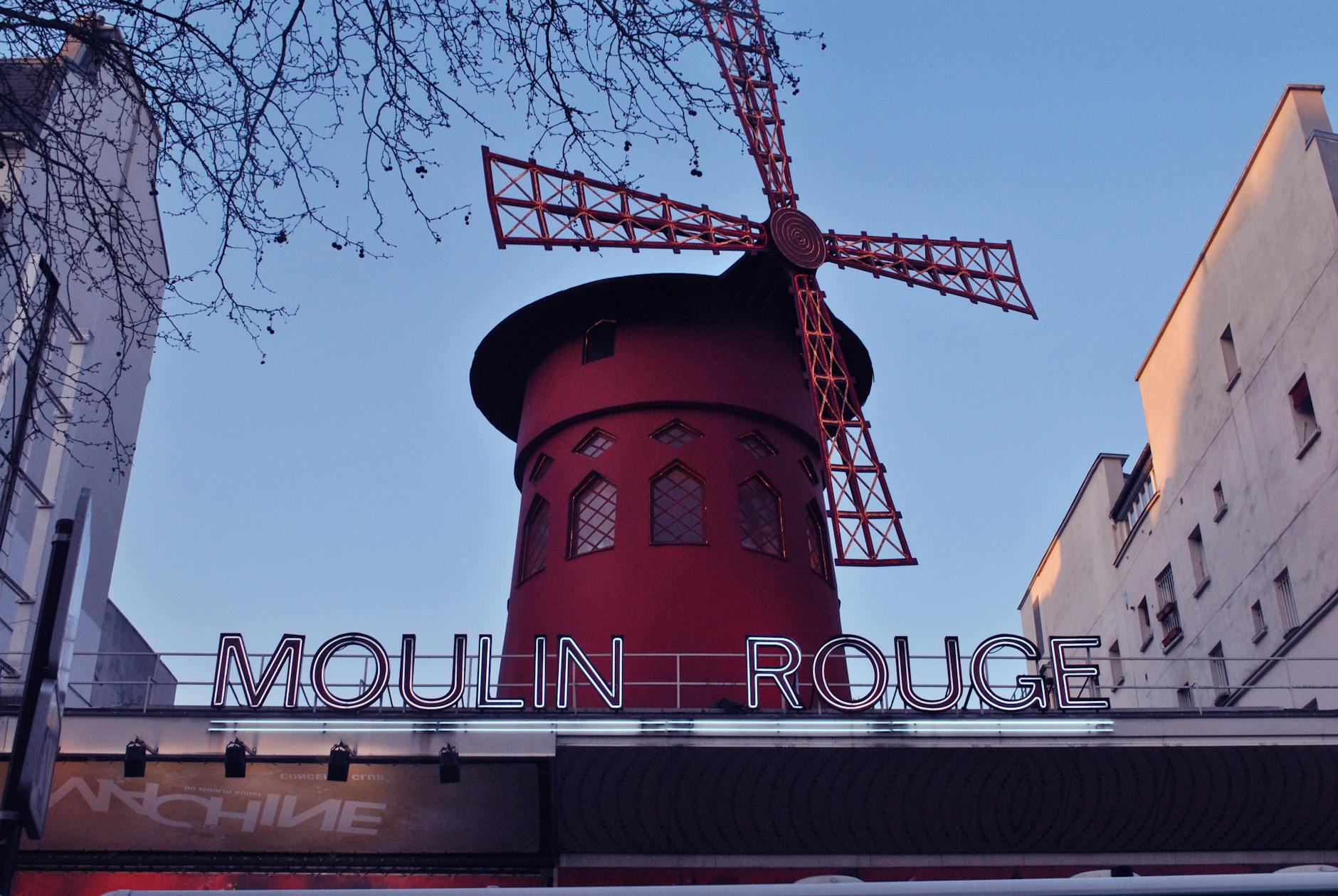 Close-up of Moulin Rouge during daytime in Paris