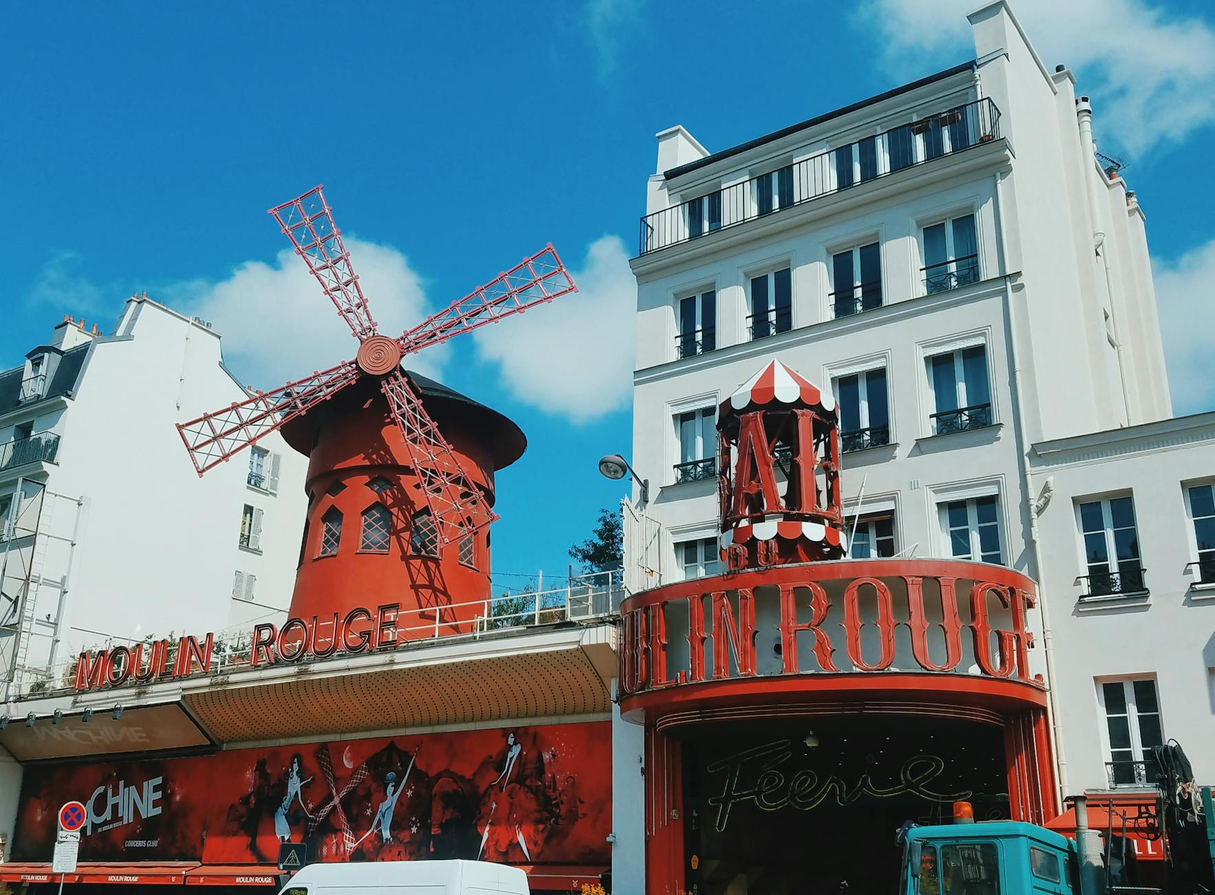Moulin Rouge red windmill against a clear blue sky