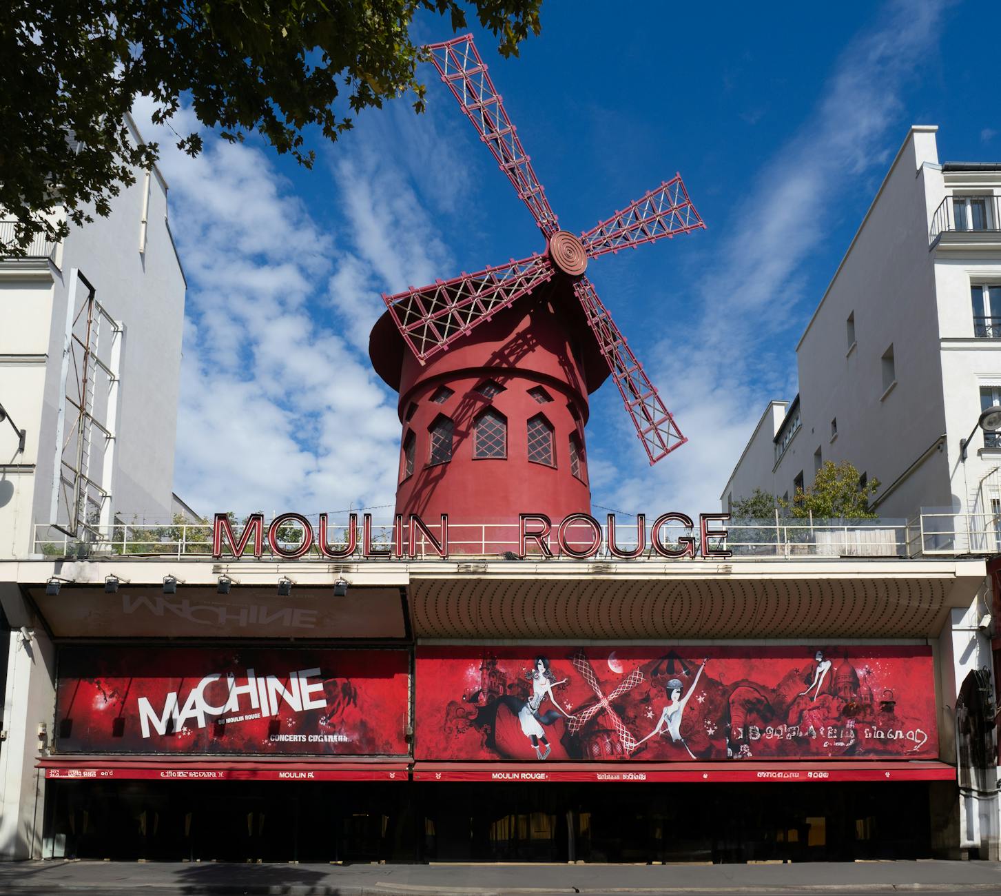 Moulin Rouge red windmill against the Paris sky