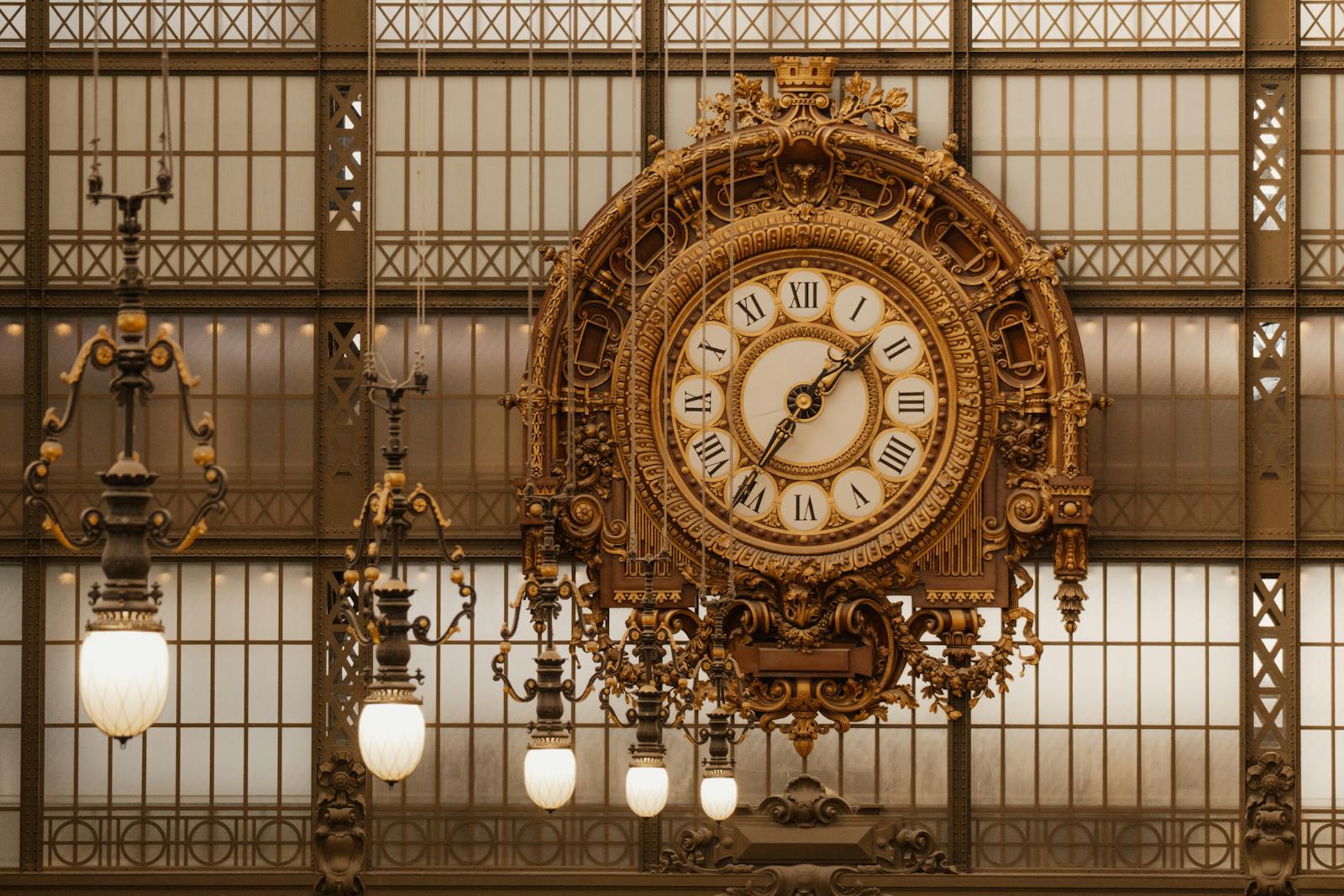 Close-up view of an ornate Beaux-Arts clock inside the Musée d'Orsay