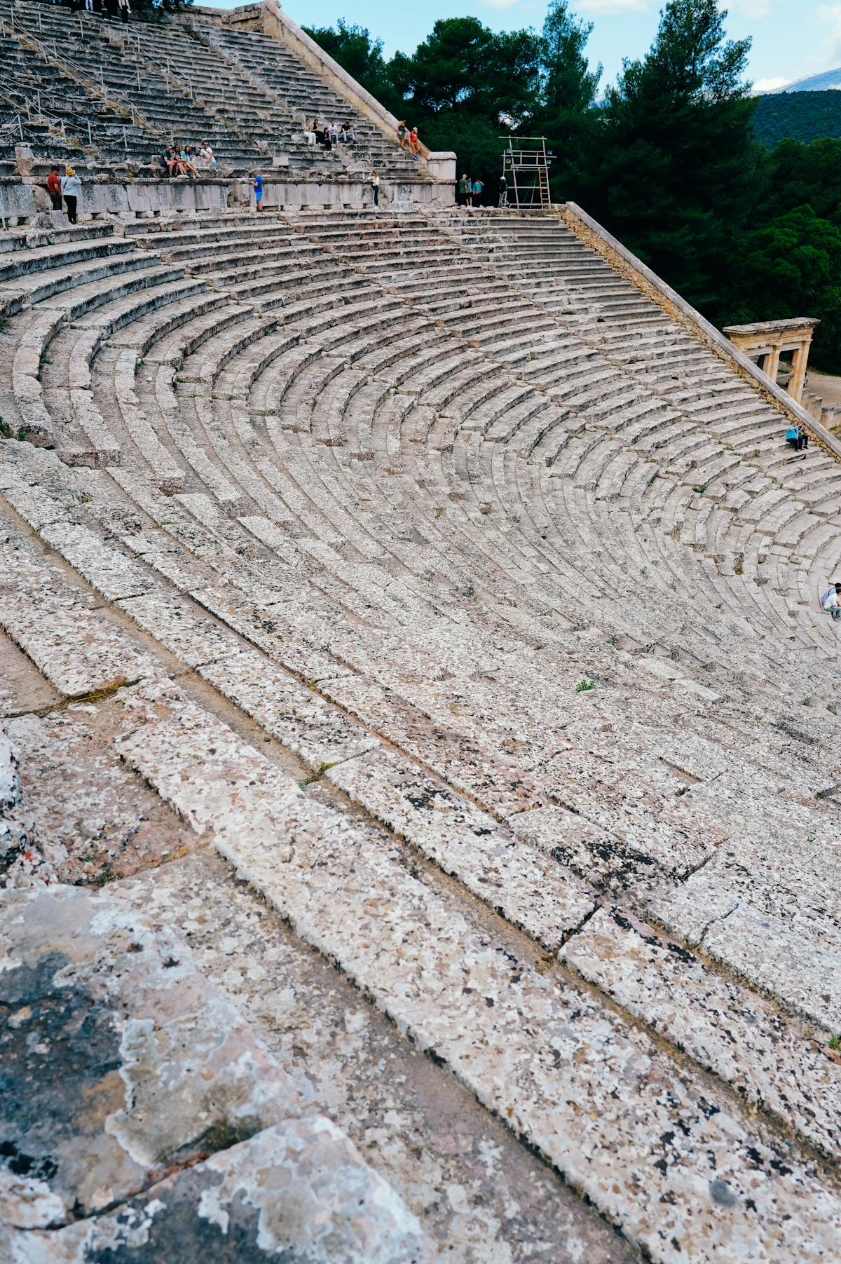 Close-up of the ancient stone seating rows at the theater of Epidaurus