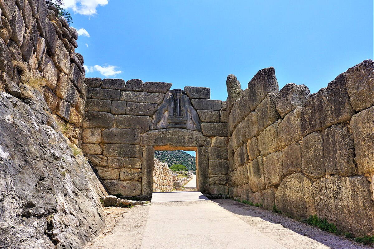 Close-up detail of the Lion Gate relief sculpture at Mycenae showing two lions flanking a column
