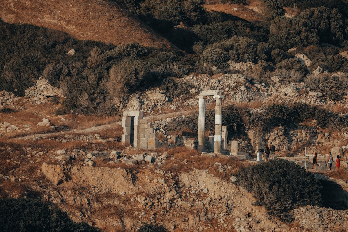 Ancient ruins at Mycenae bathed in warm golden hour light