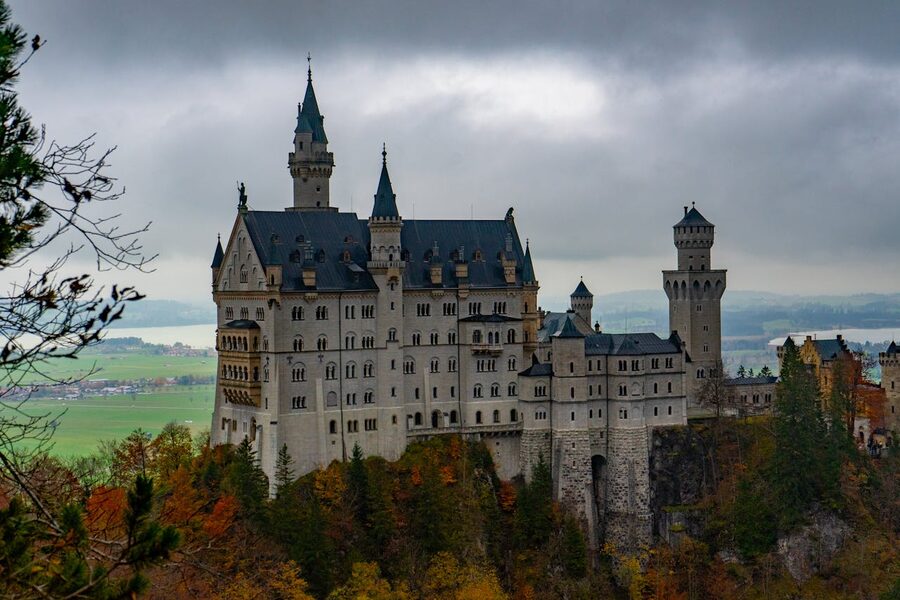 Neuschwanstein Castle amid colourful autumn foliage