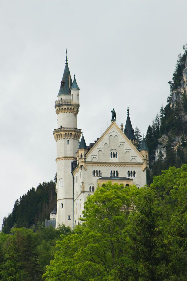 Neuschwanstein Castle amid lush greenery in Bavaria Germany