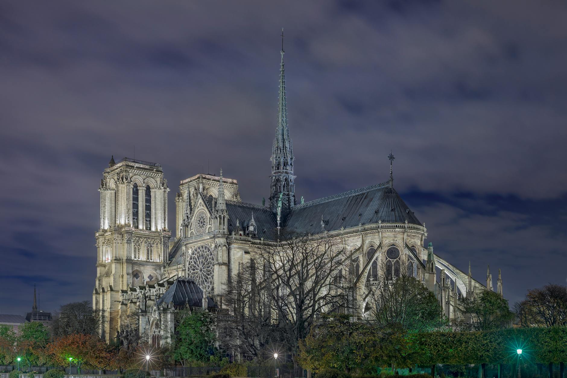 Notre-Dame Cathedral at night showcasing Gothic architecture in Paris