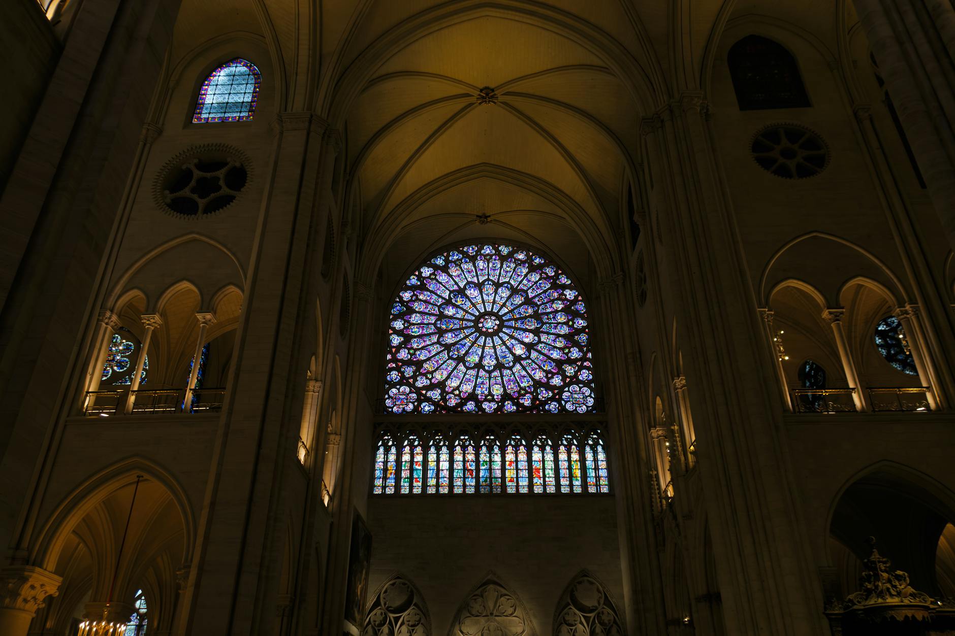 Notre-Dame interior showing the iconic rose window