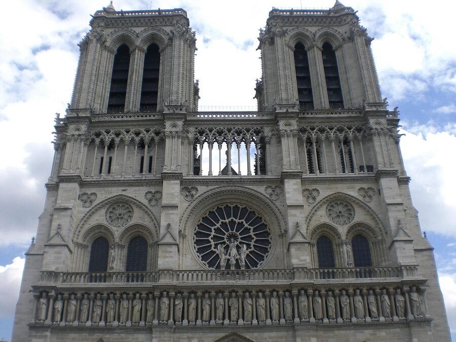 Notre Dame Cathedral in the Paris cityscape along Seine River