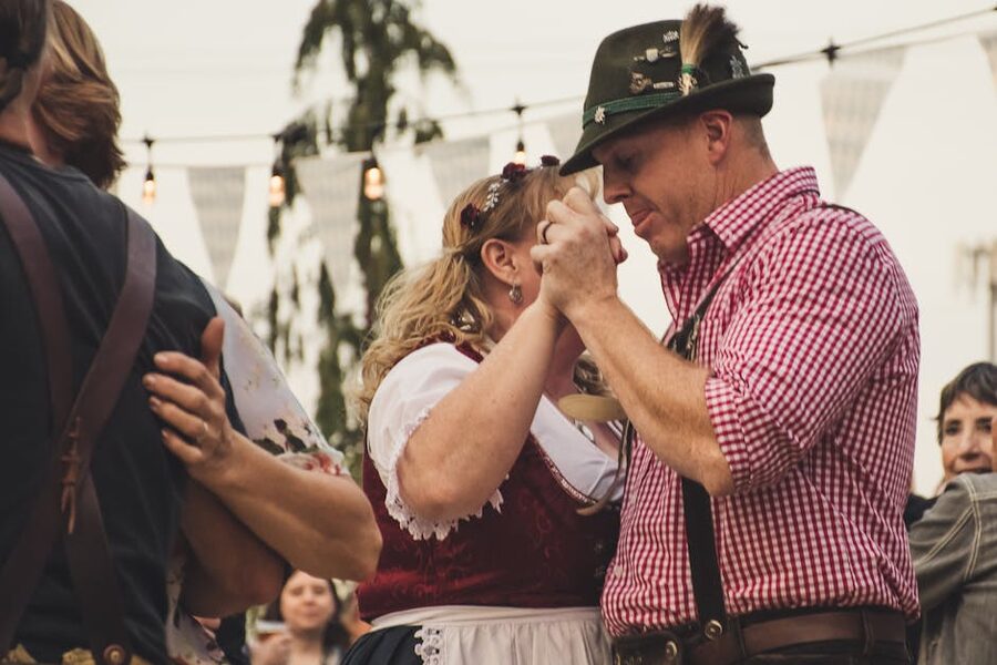 Festive couple dances at Oktoberfest