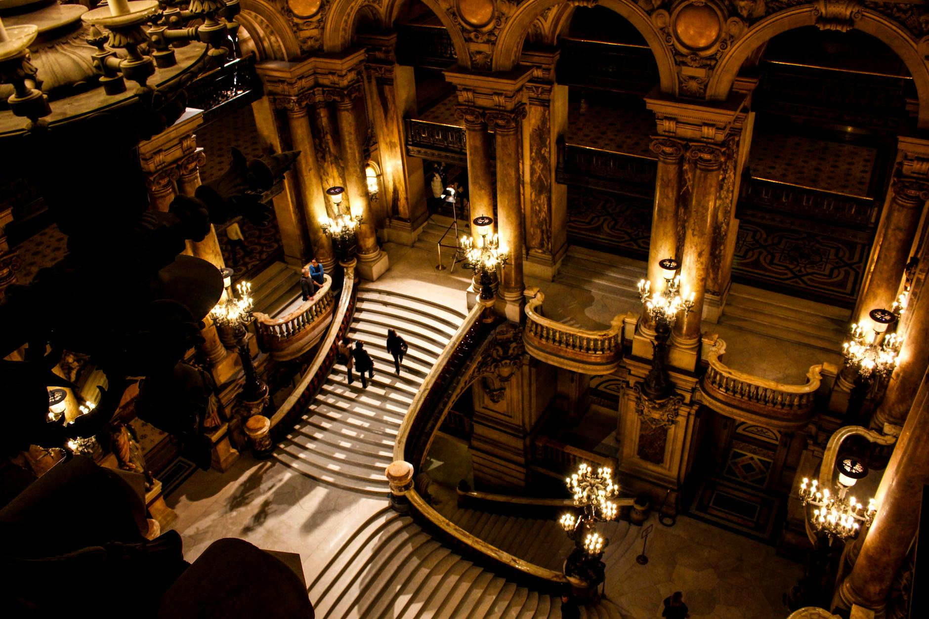 Aerial view of Opera Garnier grand staircase with chandeliers