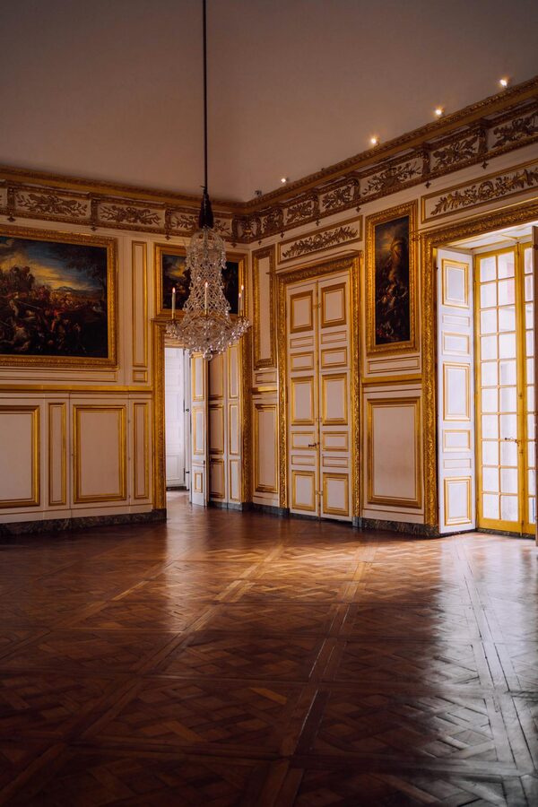 Ornate room with chandelier in a French palace