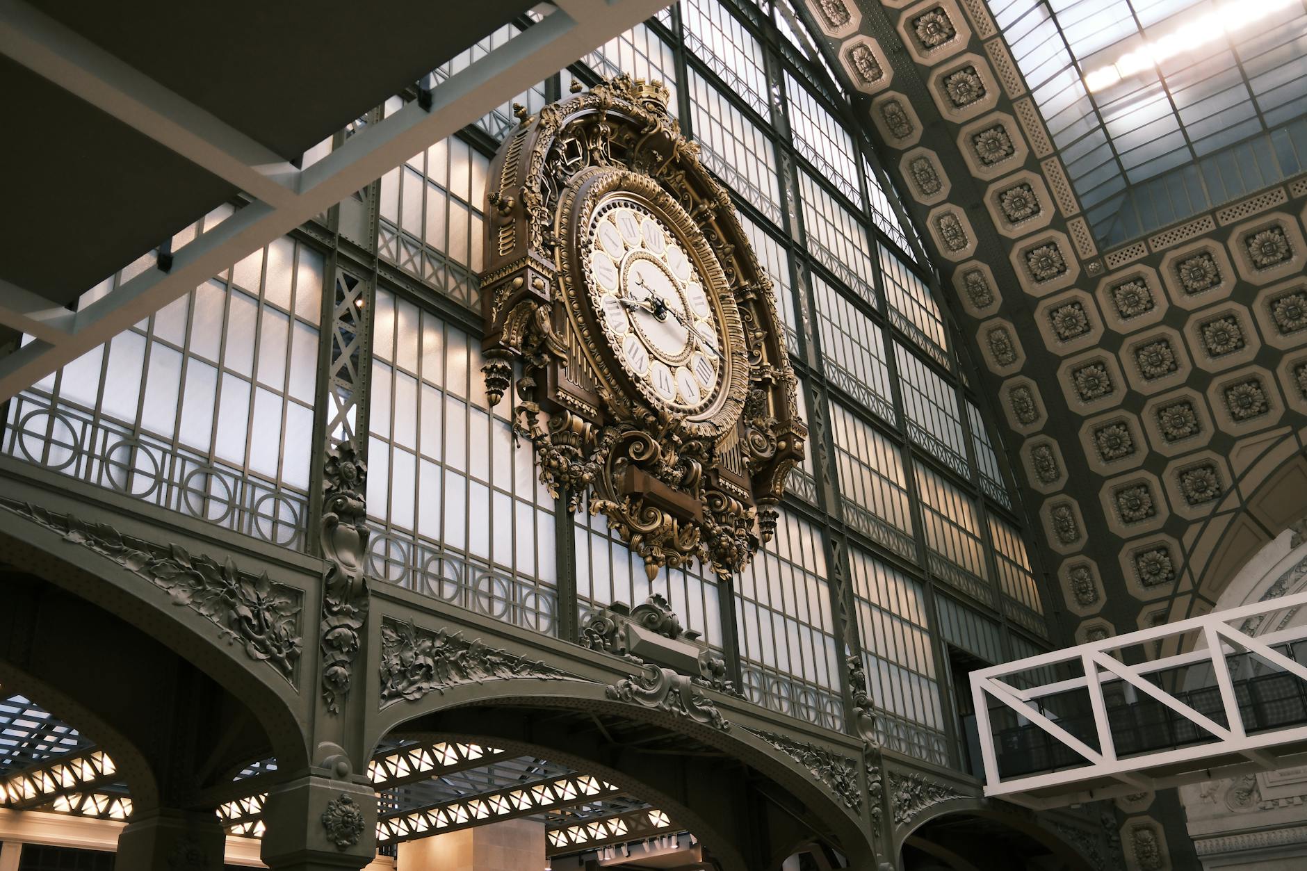 A stunning ornate clock with Art Nouveau design inside a European museum
