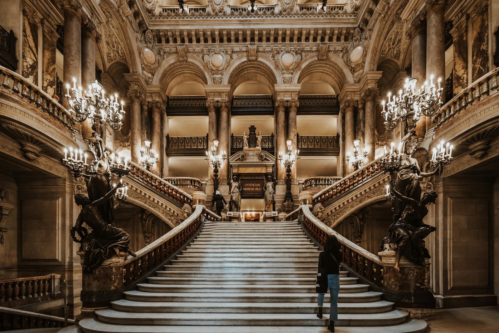 Baroque staircase with elegant railings inside the Palais Garnier