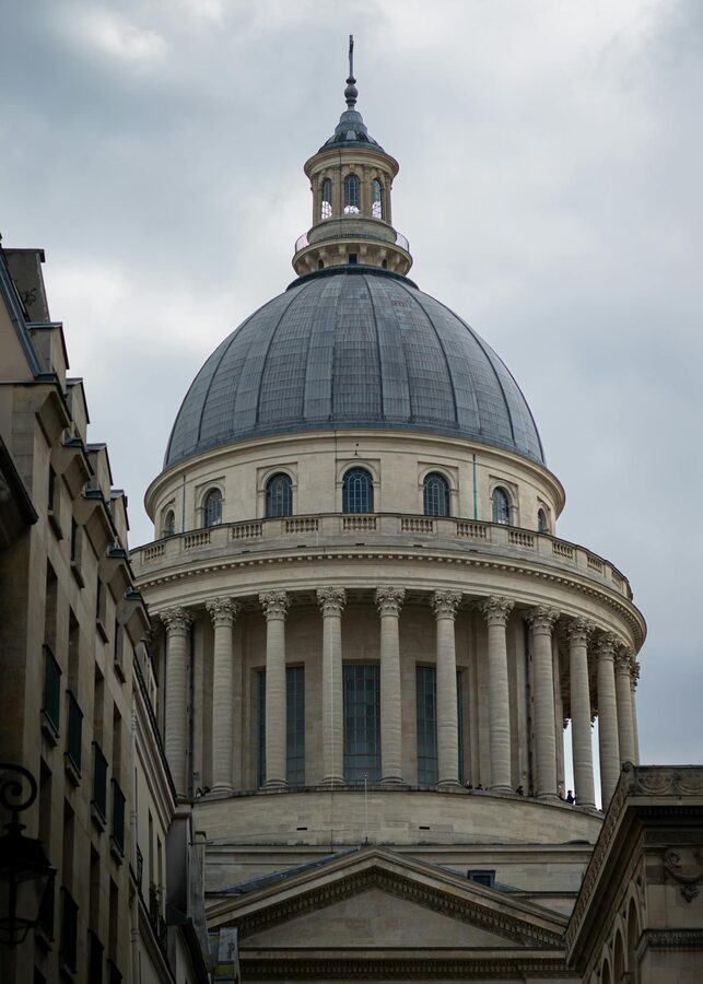 Pantheon dome architecture detail against cloudy sky in Paris