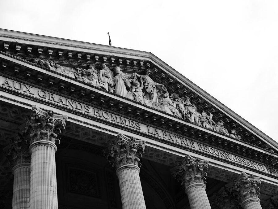 Black and white view of Pantheon facade sculptures in Paris