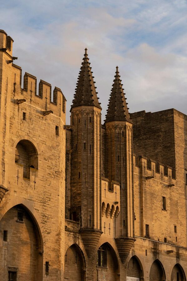The Papal Palace with Gothic architecture in Avignon France