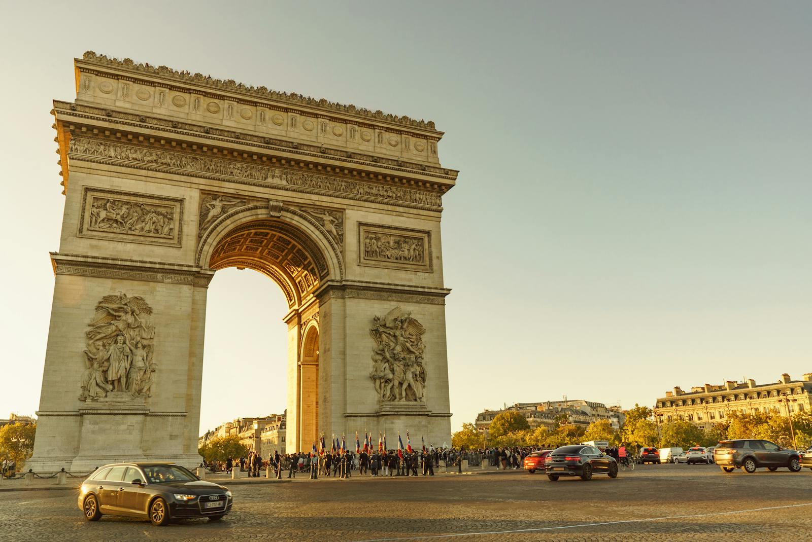 Arc de Triomphe glowing at sunset in Paris
