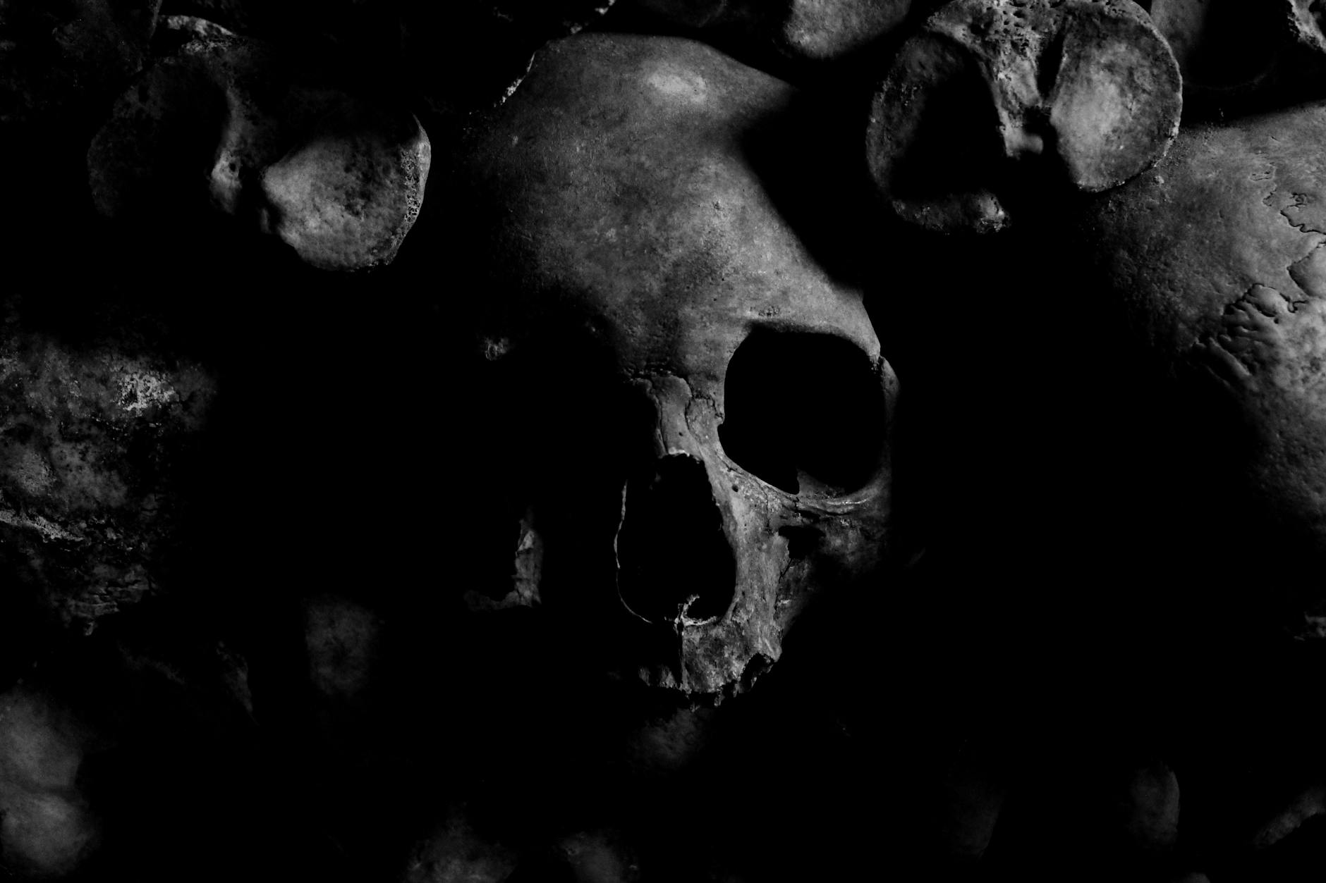Dark eerie skull with moody atmosphere from Paris Catacombs
