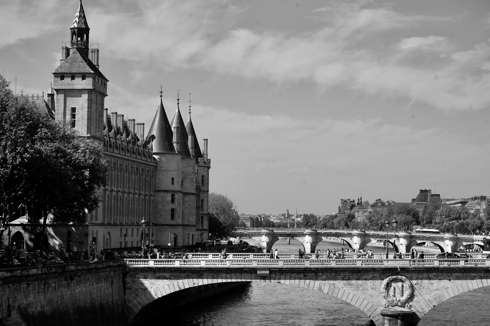 Paris Conciergerie and bridge in monochrome historic view