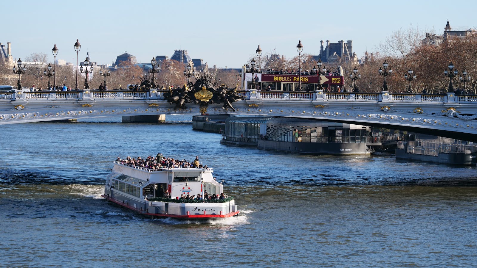 Paris Seine cruise ship passing under Pont Alexandre III bridge