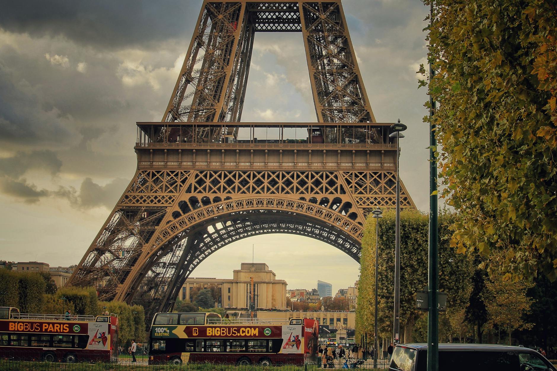 Eiffel Tower with Paris sightseeing buses in the foreground