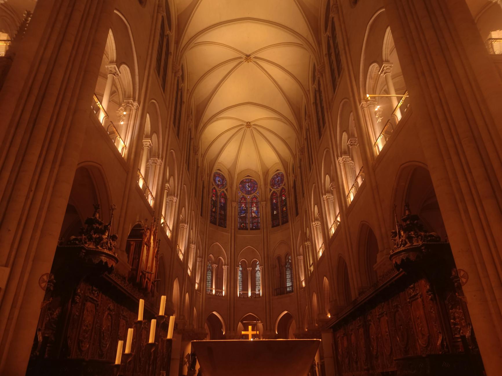 Paris Gothic cathedral interior with stained glass windows