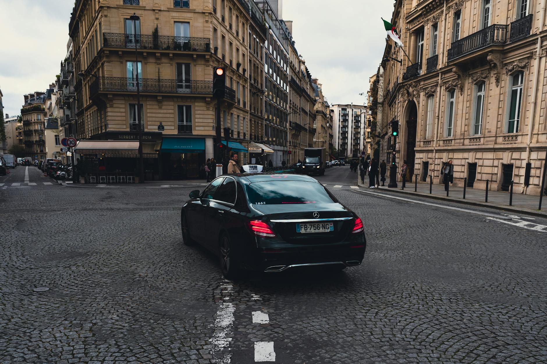 Paris taxi on an elegant evening street