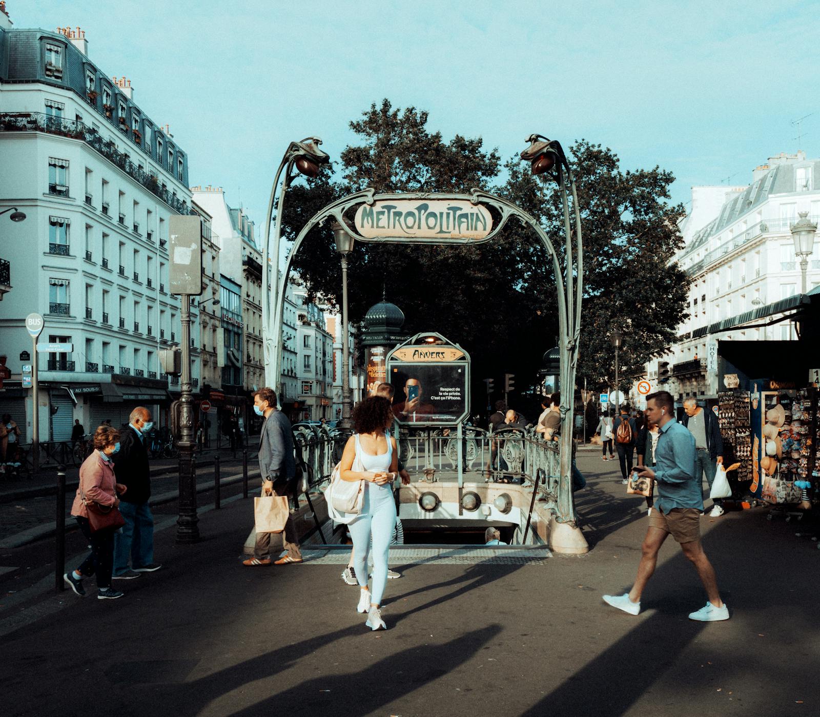 Classic Paris metro entrance on a city street