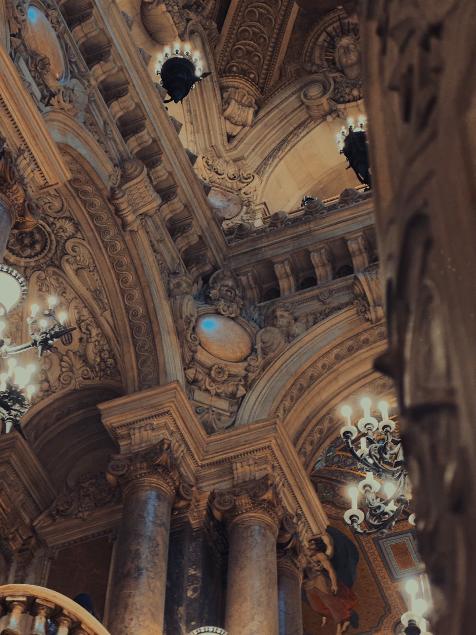 Ornate columns and architectural details inside Paris Opera House
