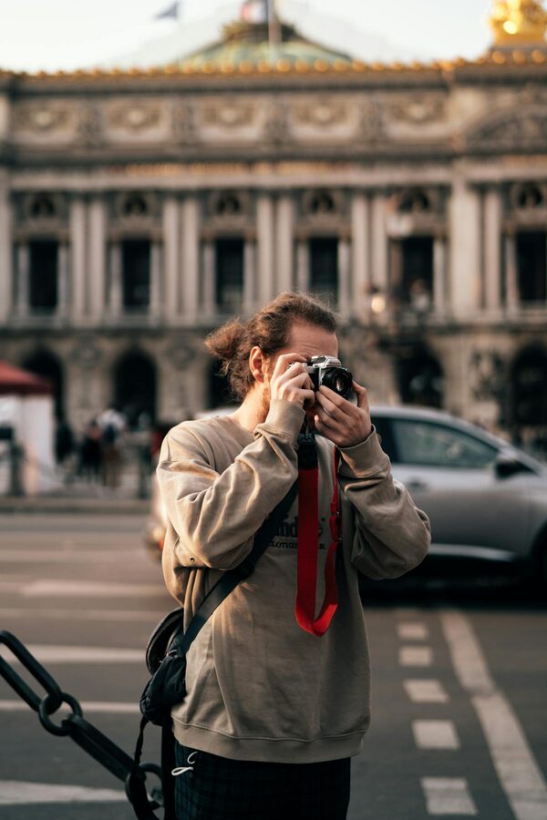 Photographer shooting tourist in Paris